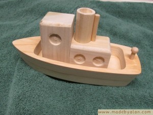 Toy wood tugboat